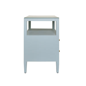 TWO DRAWER SIDE TABLE WITH OPEN TOP SHELF IN TEXTURED LIGHT BLUE LINEN WITH POLISHED BRASS KNOBS