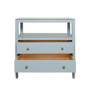 TWO DRAWER SIDE TABLE WITH OPEN TOP SHELF IN TEXTURED LIGHT BLUE LINEN WITH POLISHED BRASS KNOBS