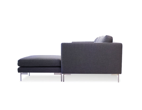 Taut sectional in dark grey with black legs