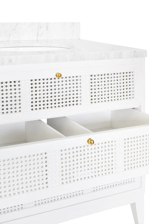 BATH VANITY IN MATTE WHITE LACQUER WITH CANE FRONT DRAWERS, WHITE MARBLE TOP, AND PORCELAIN SINK