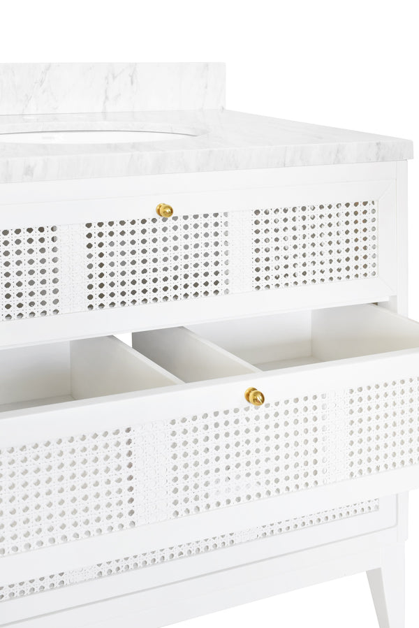 BATH VANITY IN MATTE WHITE LACQUER WITH CANE FRONT DRAWERS, WHITE MARBLE TOP, AND PORCELAIN SINK