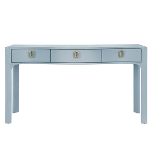 CURVED FRONT CONSOLE WITH THREE DRAWERS IN TEXTURED LIGHT BLUE LINEN WITH SATIN BRASS RING HARDWARE AND GLASS TOP