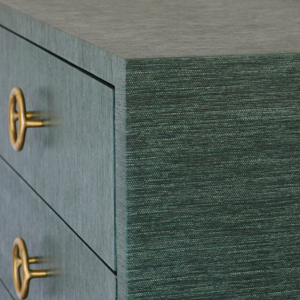 THREE DRAWER CHEST WITH ANTIQUE BRASS CIRCLE HARDWARE IN DYED GREEN GRASSCLOTH