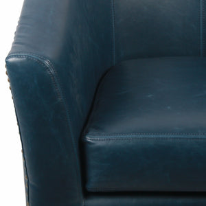 Ernest Bonded Leather Swivel Arm Chair In Vintage Blue