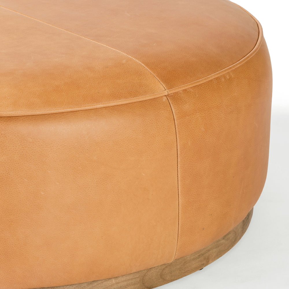 Sinclair Large Round Ottoman In Bttrscotch