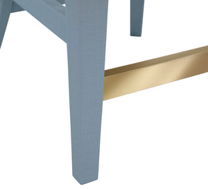 CURVED COUNTER STOOL WITH SATIN BRASS RING HARDWARE ON BACK IN PERFORMANCE WHITE LINEN UPHOLSTERY AND TEXTURED LIGHT BLUE LINEN FRAME