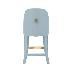 CURVED COUNTER STOOL WITH SATIN BRASS RING HARDWARE ON BACK IN PERFORMANCE WHITE LINEN UPHOLSTERY AND TEXTURED LIGHT BLUE LINEN FRAME