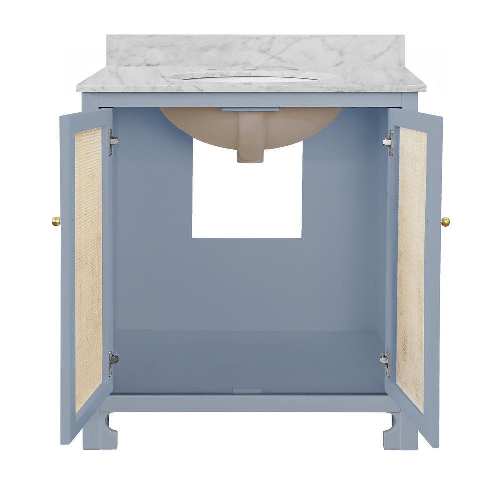 BATH VANITY IN MATTE LIGHT BLUE LACQUER WITH CANE FRONT DOORS, WHITE MARBLE TOP, PORCELAIN SINK, AND POLISHED BRASS KNOBS