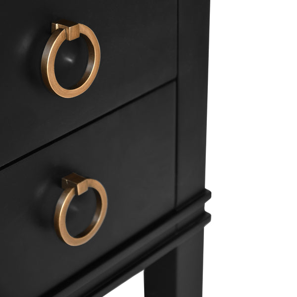 BATH VANITY IN MATTE BLACK LACQUER WITH OPEN CANE SHELF, WHITE MARBLE TOP, PORCELAIN SINK, AND ANTIQUE BRASS RING HARDWARE
