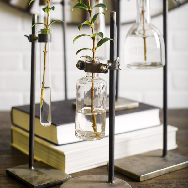 Jarvis Set of Five Dark Brown Metal and Glass Chemistry Inspired Bottles