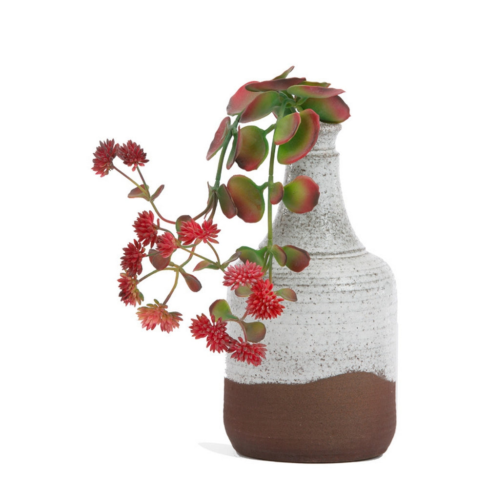 Kalanchoe Flowers in Oxide Bottle