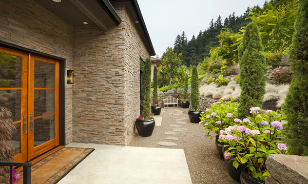 Dunbroch 1 Light Outdoor Wall Sconce in Deep Bronze + Outdoor Brass Finish